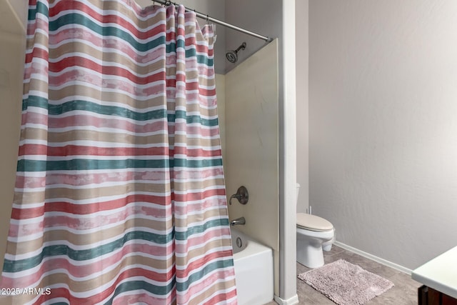 bathroom featuring shower / bath combo, tile patterned floors, and toilet