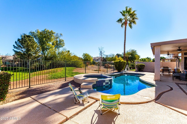 view of pool featuring an in ground hot tub, ceiling fan, and a patio area