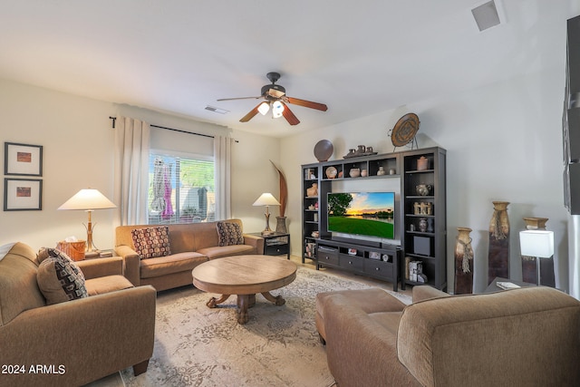 living room with ceiling fan