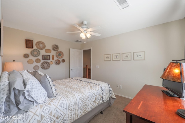 bedroom with ceiling fan and carpet floors