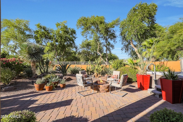 view of patio featuring an outdoor fire pit