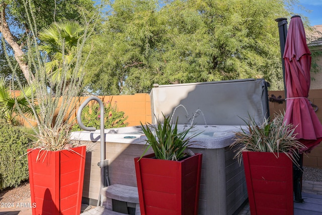 view of patio featuring a hot tub