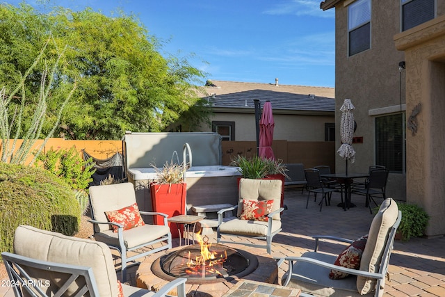 view of patio featuring a fire pit