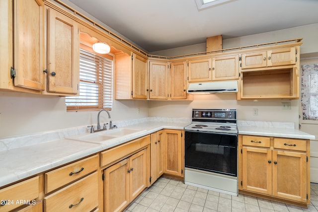 kitchen featuring electric range, light tile patterned floors, and sink