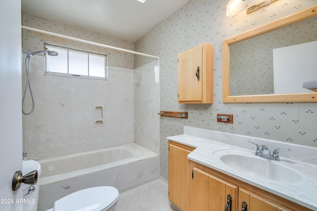 full bathroom featuring tub / shower combination, vanity, and toilet