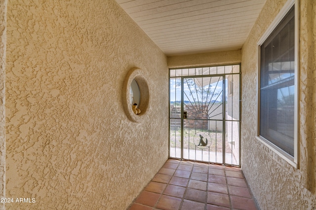 entryway with wooden ceiling