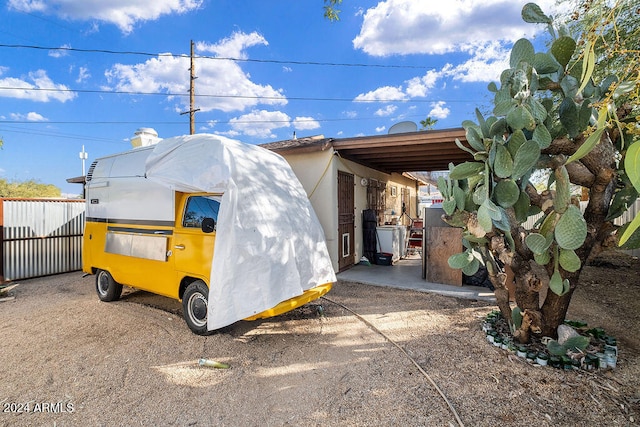 view of home's exterior featuring a storage shed