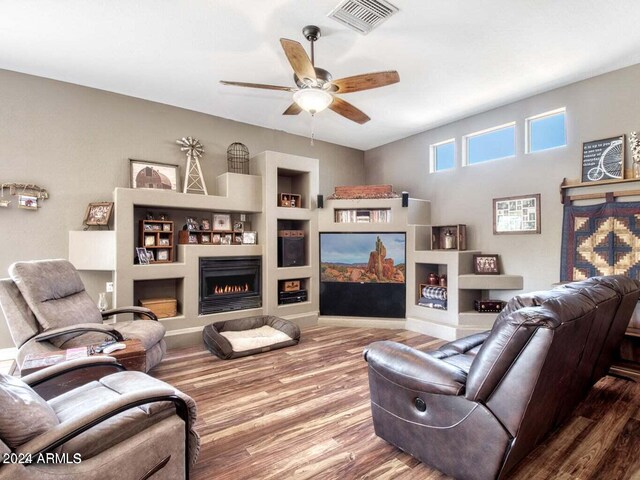 tiled dining space with ceiling fan