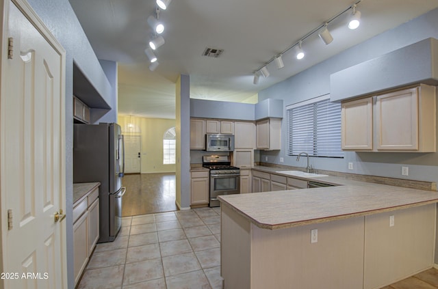 4714 E Paso Trl, Phoenix, AZ 85050 - kitchen featuring track lighting, visible vents, appliances with stainless steel finishes, and a sink