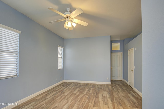 4714 E Paso Trl, Phoenix, AZ 85050 - spare room with ceiling fan, baseboards, and wood finished floors