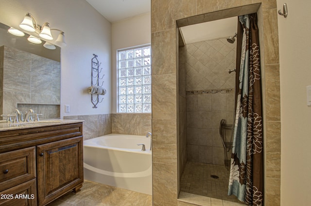 4714 E Paso Trl, Phoenix, AZ 85050 - bathroom featuring a garden tub, tile walls, tiled shower, a chandelier, and vanity