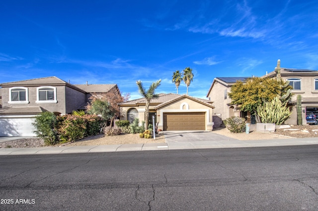 4714 E Paso Trl, Phoenix, AZ 85050 - view of front of property with a garage, driveway, and stucco siding