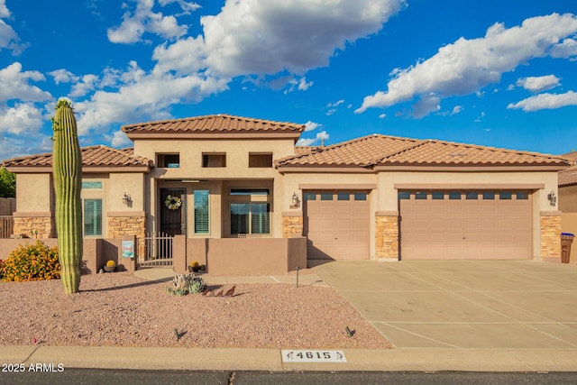 4615 S Primrose Dr, Gold Canyon, AZ 85118 - view of front of property with a garage, stucco siding, and stone siding