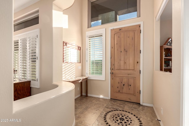 4615 S Primrose Dr, Gold Canyon, AZ 85118 - tiled entryway featuring baseboards and a towering ceiling