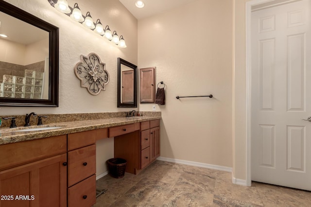 4615 S Primrose Dr, Gold Canyon, AZ 85118 - bathroom featuring double vanity, baseboards, and a sink