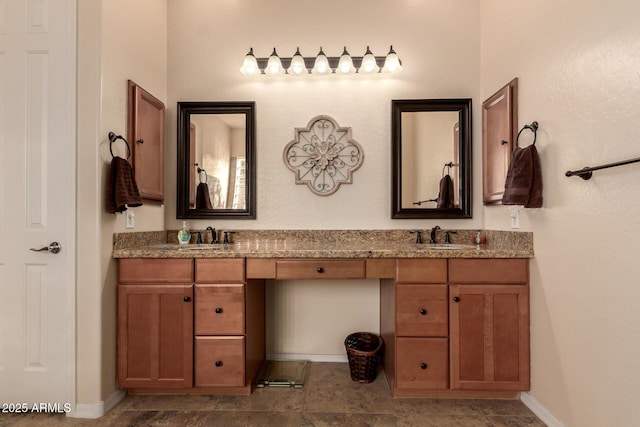4615 S Primrose Dr, Gold Canyon, AZ 85118 - full bathroom with double vanity, baseboards, and a sink
