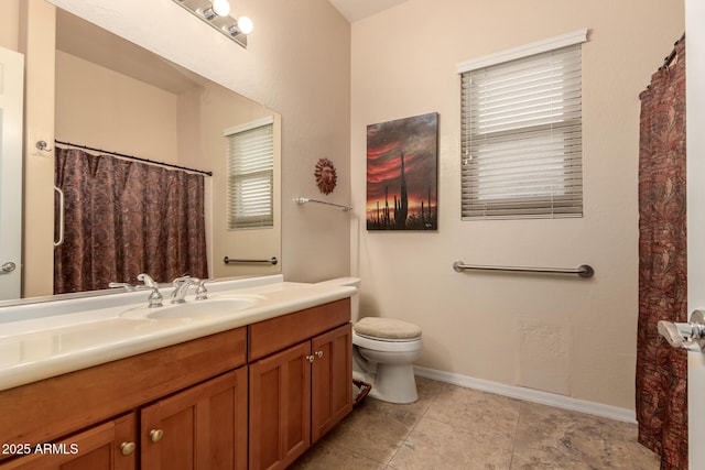4615 S Primrose Dr, Gold Canyon, AZ 85118 - bathroom featuring vanity, baseboards, tile patterned floors, and toilet