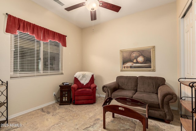 4615 S Primrose Dr, Gold Canyon, AZ 85118 - living room featuring ceiling fan, visible vents, and baseboards