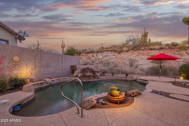 4615 S Primrose Dr, Gold Canyon, AZ 85118 - pool at dusk featuring a fenced in pool, a fenced backyard, and a patio