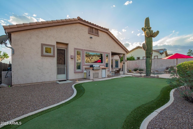 4615 S Primrose Dr, Gold Canyon, AZ 85118 - rear view of house with a patio, stucco siding, and fence
