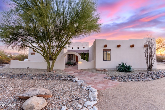 view of adobe home