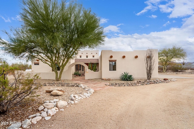 view of front of property with a patio