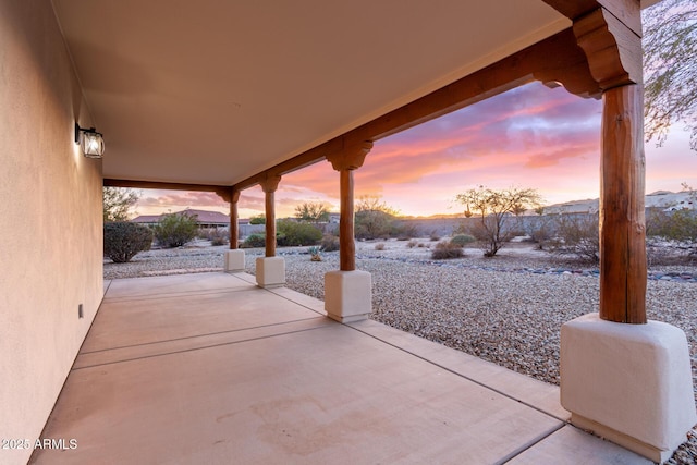 snow covered patio featuring a mountain view