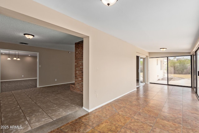 1874 E Huntington Dr, Tempe, AZ 85282 - spare room featuring baseboards