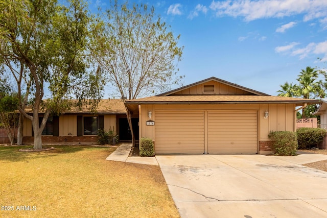 1874 E Huntington Dr, Tempe, AZ 85282 - single story home with an attached garage, brick siding, driveway, a front yard, and board and batten siding
