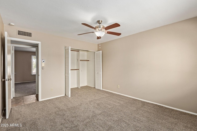 1874 E Huntington Dr, Tempe, AZ 85282 - unfurnished bedroom with carpet, a closet, baseboards, and a ceiling fan