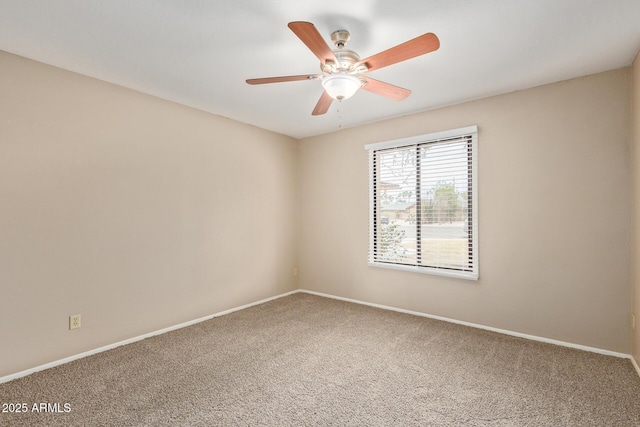 1874 E Huntington Dr, Tempe, AZ 85282 - carpeted spare room featuring baseboards and a ceiling fan
