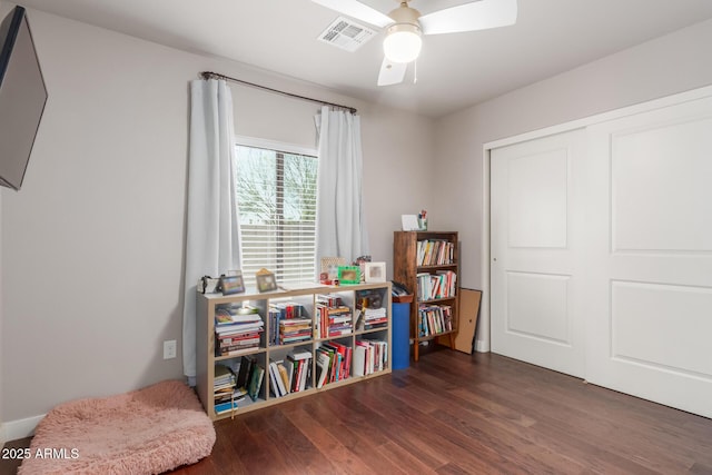 game room featuring visible vents, ceiling fan, and wood finished floors