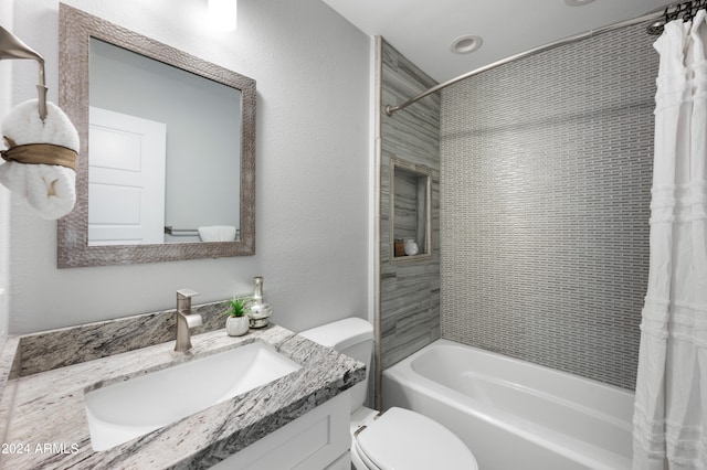 full bathroom featuring vanity, toilet, and shower / bathtub combination with curtain