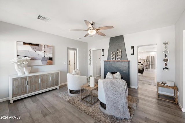 interior space featuring ceiling fan and wood-type flooring