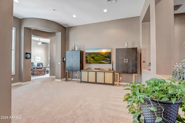 living room featuring recessed lighting, visible vents, a ceiling fan, carpet flooring, and baseboards