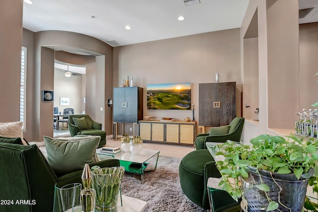 living area with visible vents and recessed lighting