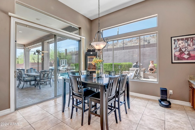 dining room with light tile patterned flooring