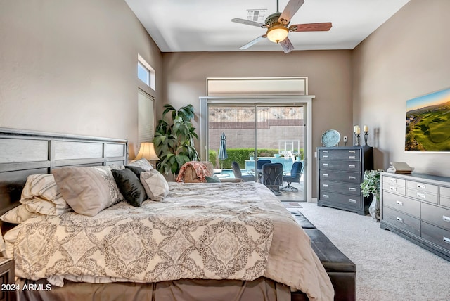 bedroom featuring ceiling fan, light carpet, and access to outside