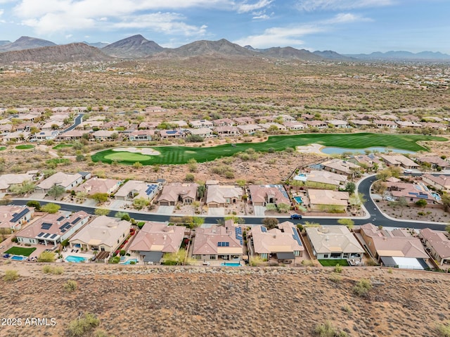 birds eye view of property featuring a residential view, a mountain view, and golf course view