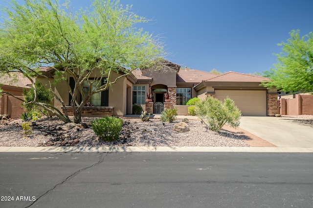 view of front of property featuring a garage