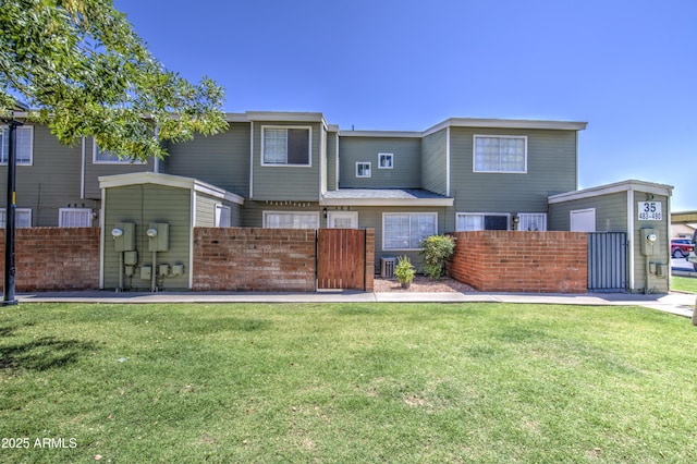 2301 E University Dr Unit 488, Mesa, AZ 85213 - rear view of house featuring a gate and cooling unit