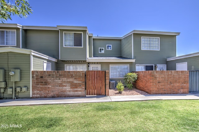 2301 E University Dr Unit 488, Mesa, AZ 85213 - back of house featuring a gate and cooling unit