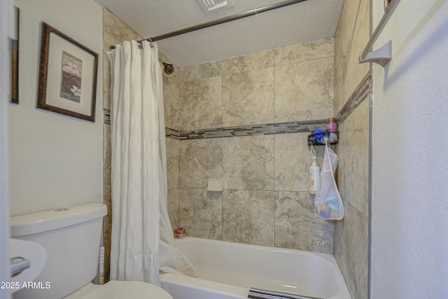 2301 E University Dr Unit 488, Mesa, AZ 85213 - bathroom featuring toilet and shower / bath combination with curtain