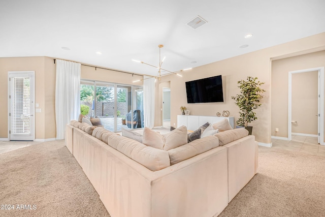 living area with recessed lighting, light tile patterned floors, baseboards, light colored carpet, and a chandelier