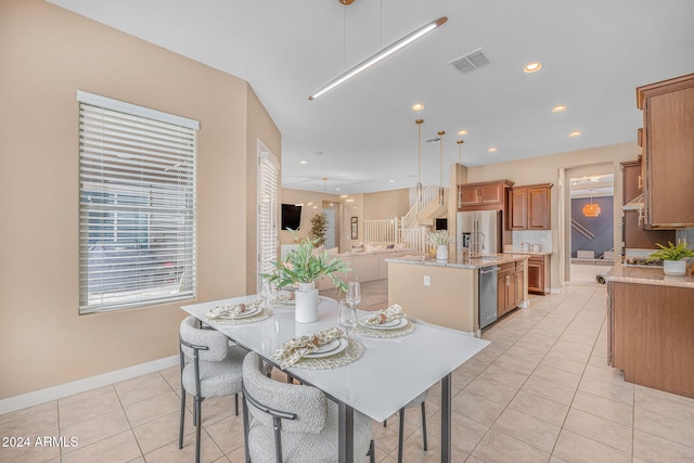 dining area featuring visible vents, recessed lighting, stairway, light tile patterned floors, and baseboards