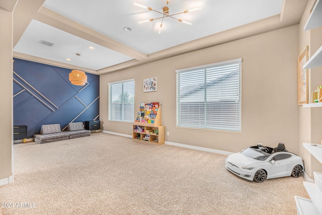 rec room with visible vents, baseboards, and carpet