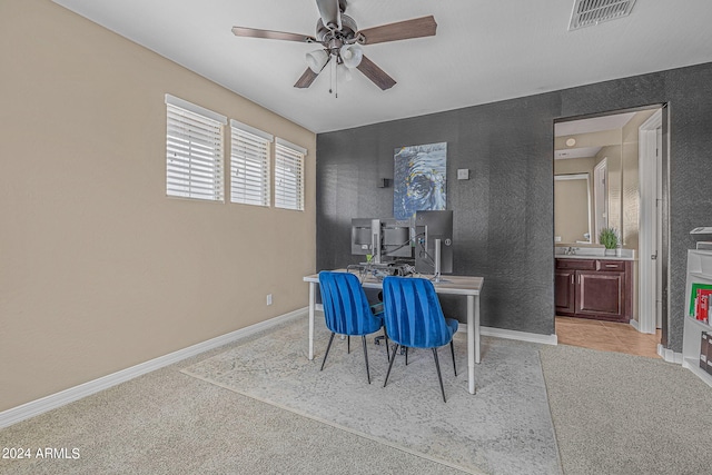 dining space with visible vents, baseboards, and a ceiling fan