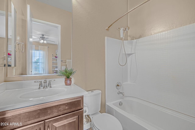 bathroom featuring vanity, toilet, and shower / tub combination