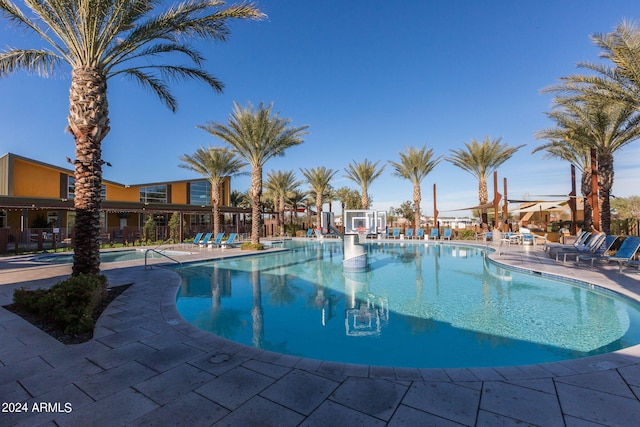 community pool featuring a patio area