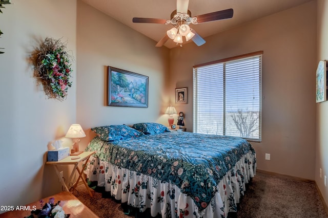 carpeted bedroom with baseboards and a ceiling fan